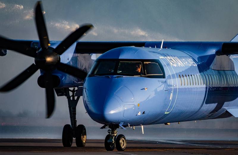 Kyrgyzstan's Asman Airlines De Havilland Dash 8-400 turboprop regional aircraft