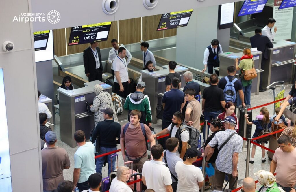 Passengers at flight check-in arrea at Tashkent airport in Uzbekistan