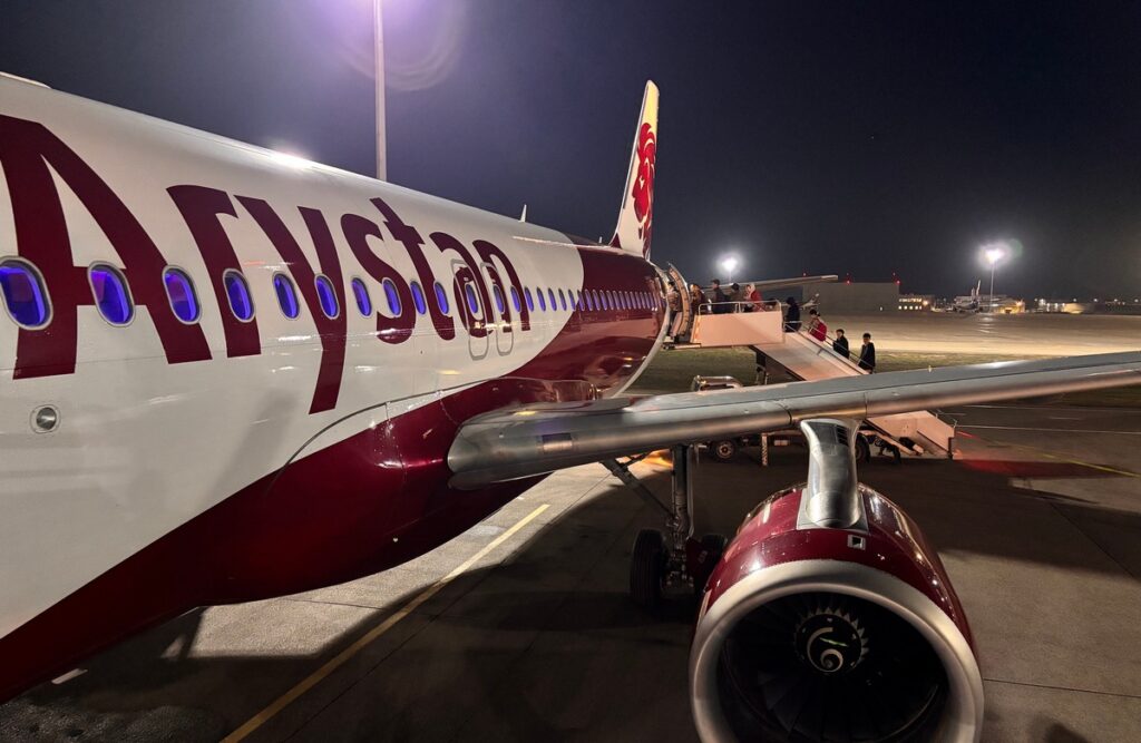 LCC FlyArystan A320 aircraft boarding at Astana airport