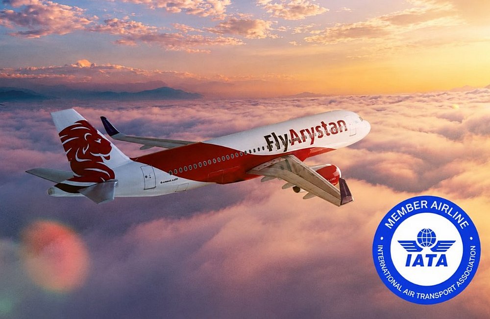 FlyArystan aircraft inflight plus IATA logo